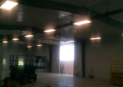 Commercial warehouse lighting by Manmiller Electric